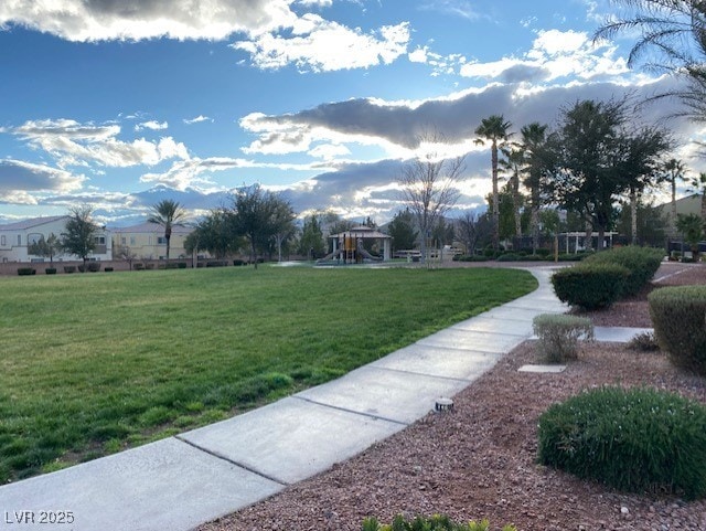 6316 Beige Bluff St Unit 201, North Las Vegas, NV 89081 - view of community with a yard