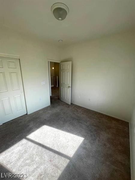 6316 Beige Bluff St Unit 201, North Las Vegas, NV 89081 - unfurnished bedroom with carpet flooring and a closet