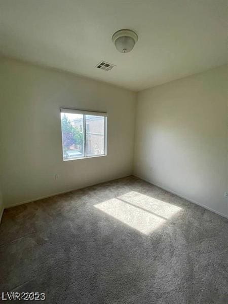 6316 Beige Bluff St Unit 201, North Las Vegas, NV 89081 - unfurnished room featuring carpet flooring and baseboards
