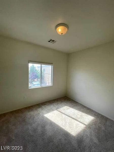 6316 Beige Bluff St Unit 201, North Las Vegas, NV 89081 - spare room with carpet flooring and baseboards