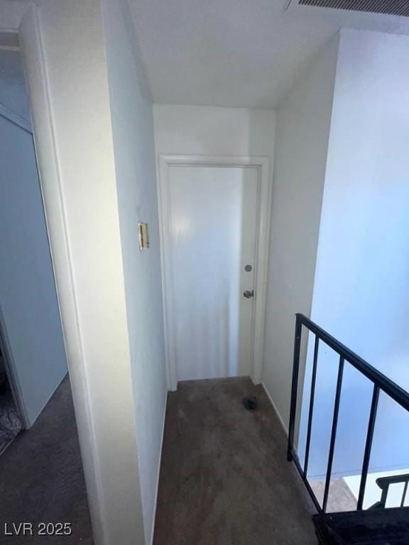 4363 Spencer St Unit 8, Las Vegas, NV 89119 - hallway featuring carpet and an upstairs landing