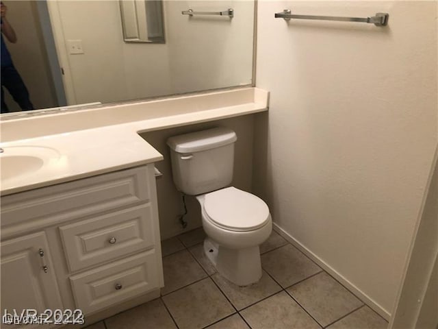 75 N Valle Verde Dr Unit 2121, Henderson, NV 89074 - bathroom featuring toilet, tile patterned floors, vanity, and baseboards