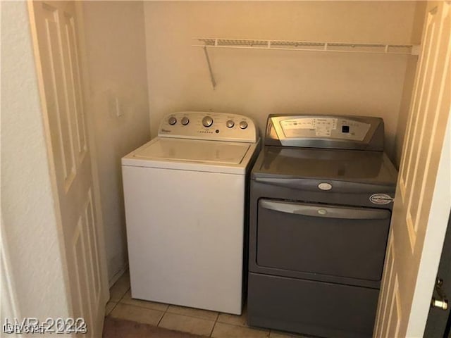 75 N Valle Verde Dr Unit 2121, Henderson, NV 89074 - laundry area featuring independent washer and dryer and light tile patterned flooring