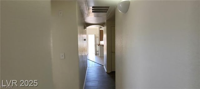 75 N Valle Verde Dr Unit 2121, Henderson, NV 89074 - hall with arched walkways and wood finished floors