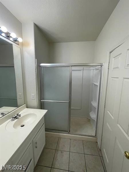 75 N Valle Verde Dr Unit 2121, Henderson, NV 89074 - bathroom featuring vanity, a shower stall, and tile patterned flooring