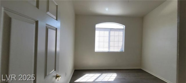 75 N Valle Verde Dr Unit 2121, Henderson, NV 89074 - unfurnished room featuring baseboards and wood finished floors
