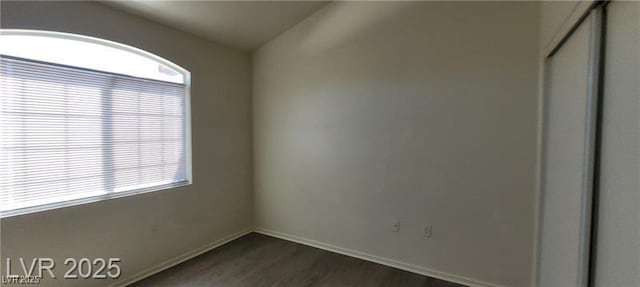 75 N Valle Verde Dr Unit 2121, Henderson, NV 89074 - unfurnished room with dark wood-style floors and baseboards