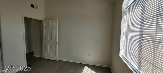 75 N Valle Verde Dr Unit 2121, Henderson, NV 89074 - unfurnished room featuring dark wood-type flooring and baseboards