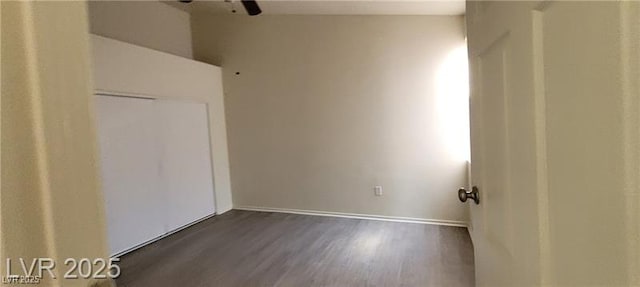 75 N Valle Verde Dr Unit 2121, Henderson, NV 89074 - unfurnished bedroom featuring dark wood finished floors, baseboards, and a ceiling fan