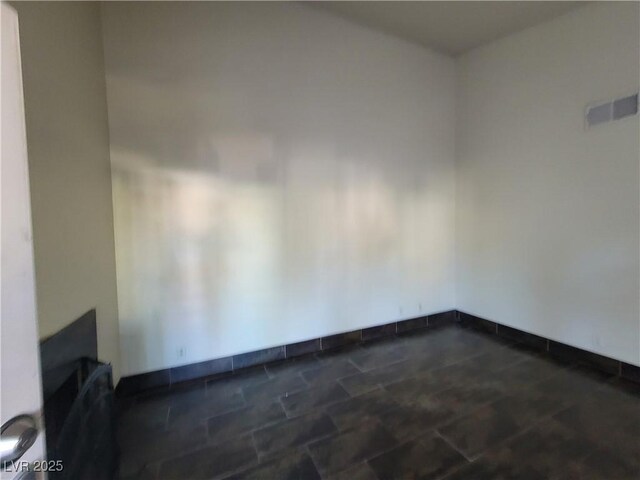 2761 Lodestone Dr Unit 63, Las Vegas, NV 89117 - spare room with baseboards