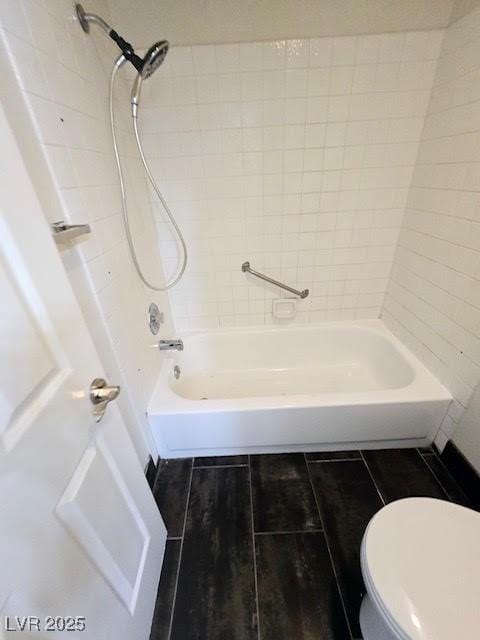 2761 Lodestone Dr Unit 63, Las Vegas, NV 89117 - bathroom featuring toilet and bathing tub / shower combination