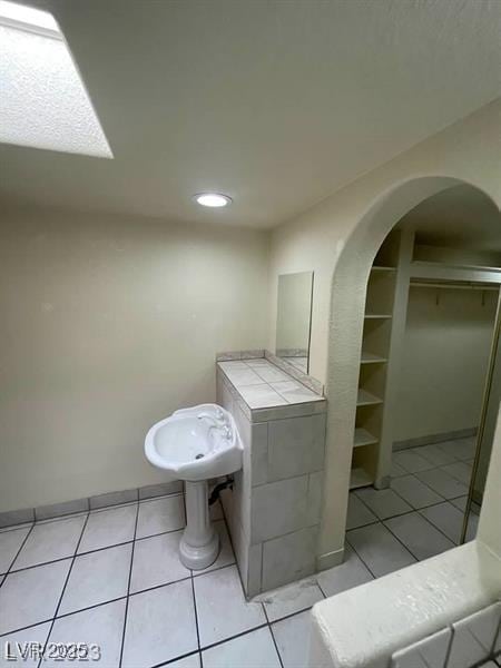 3797 Monument St, Las Vegas, NV 89121 - bathroom featuring tile patterned floors and recessed lighting