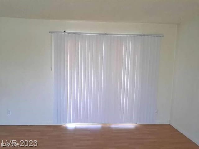 3797 Monument St, Las Vegas, NV 89121 - empty room featuring wood finished floors