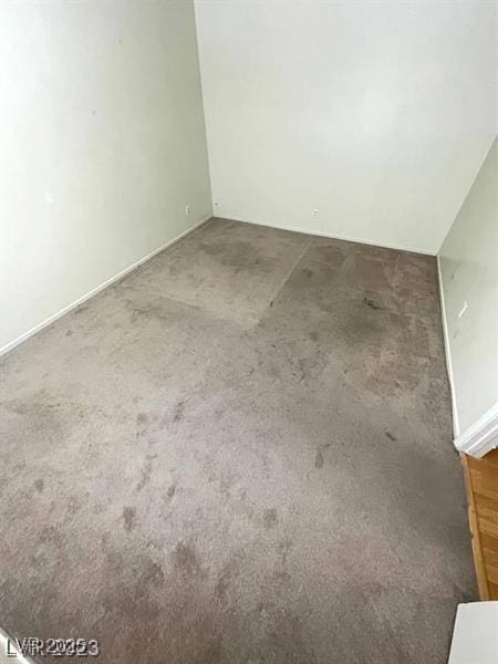 3797 Monument St, Las Vegas, NV 89121 - carpeted spare room with baseboards