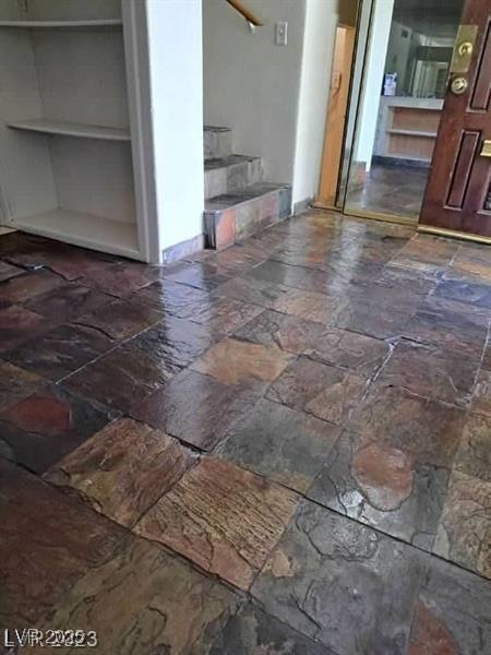 3797 Monument St, Las Vegas, NV 89121 - living area featuring stone tile floors