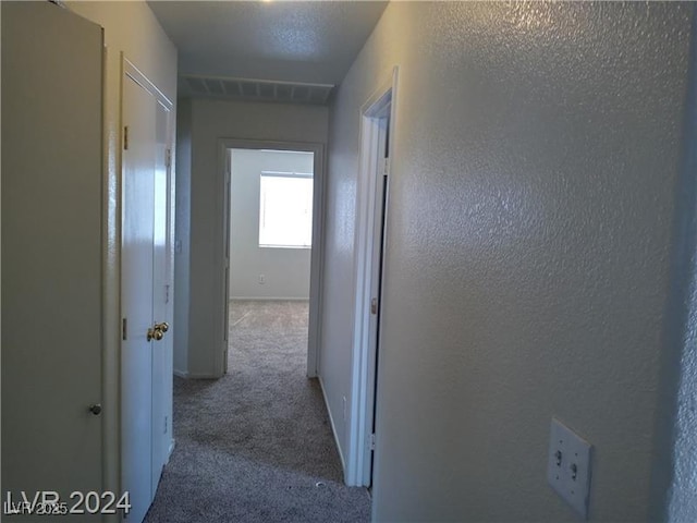 70 Belle Essence Ave, Las Vegas, NV 89123 - corridor featuring carpet floors and baseboards