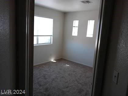 70 Belle Essence Ave, Las Vegas, NV 89123 - spare room with carpet flooring and baseboards