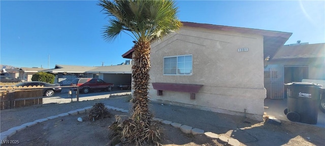 1301 Madison Ave, Las Vegas, NV 89106 - view of side of home featuring stucco siding