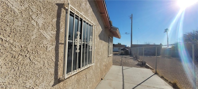1301 Madison Ave, Las Vegas, NV 89106 - view of home's exterior featuring stucco siding and a patio