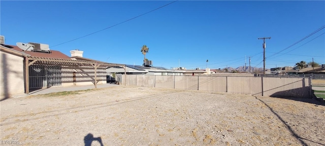 1301 Madison Ave, Las Vegas, NV 89106 - fenced backyard featuring central AC