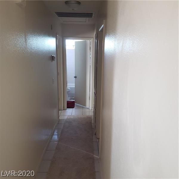 5284 Wellesley Ave, Las Vegas, NV 89122 - hall with light tile patterned floors