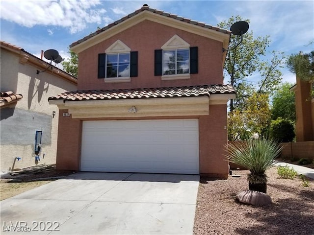 9937 La Paca Ave, Las Vegas, NV 89117 - view of front of house featuring an attached garage, a tile roof, driveway, and stucco siding