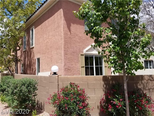 9937 La Paca Ave, Las Vegas, NV 89117 - view of side of property with stucco siding