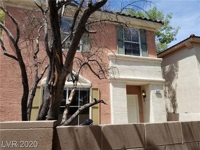 9937 La Paca Ave, Las Vegas, NV 89117 - view of front of house with stucco siding