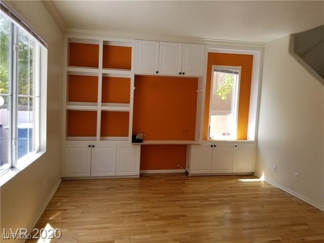9937 La Paca Ave, Las Vegas, NV 89117 - unfurnished room featuring light wood-style flooring and baseboards