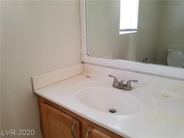 9937 La Paca Ave, Las Vegas, NV 89117 - half bath with vanity and toilet