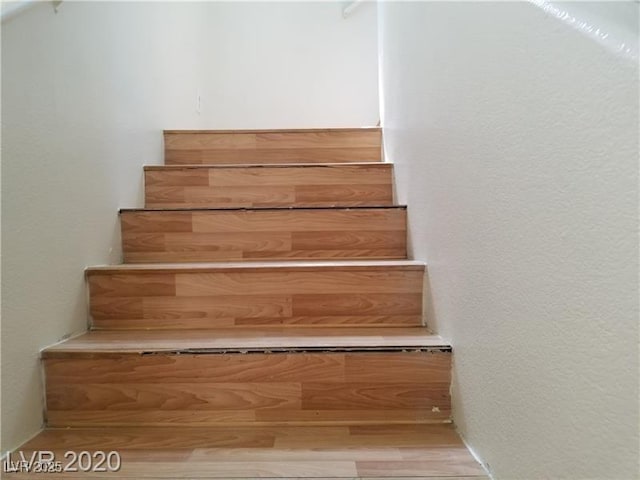 9937 La Paca Ave, Las Vegas, NV 89117 - stairway featuring wood finished floors