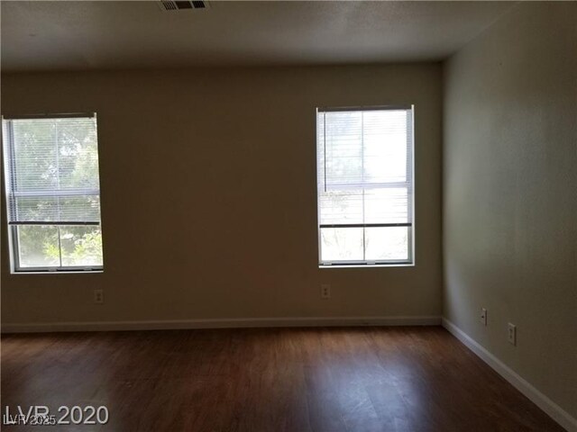 9937 La Paca Ave, Las Vegas, NV 89117 - spare room featuring wood finished floors and baseboards
