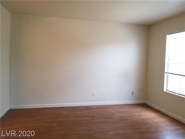 9937 La Paca Ave, Las Vegas, NV 89117 - empty room with wood finished floors and baseboards