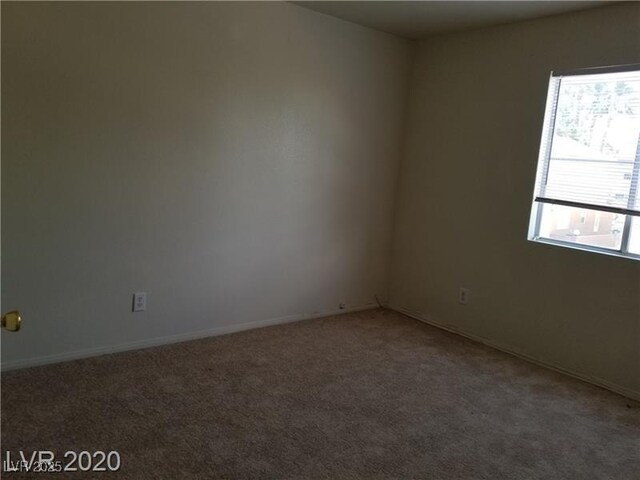 9937 La Paca Ave, Las Vegas, NV 89117 - carpeted empty room with baseboards