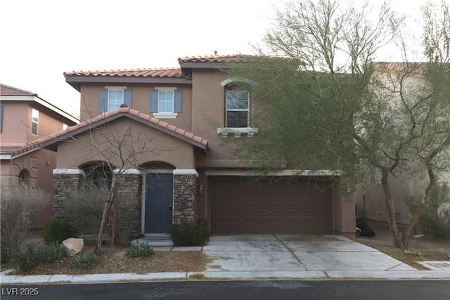8749 Brilliant Star Dr, Las Vegas, NV 89178 - mediterranean / spanish-style house featuring stucco siding, a tile roof, an attached garage, and concrete driveway