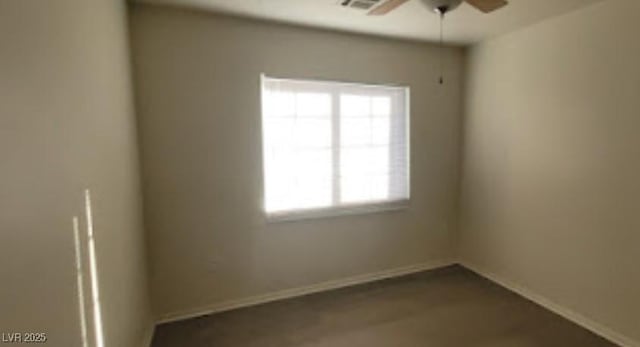 8695 Canfield Canyon Ave, Las Vegas, NV 89178 - unfurnished room featuring a ceiling fan and baseboards