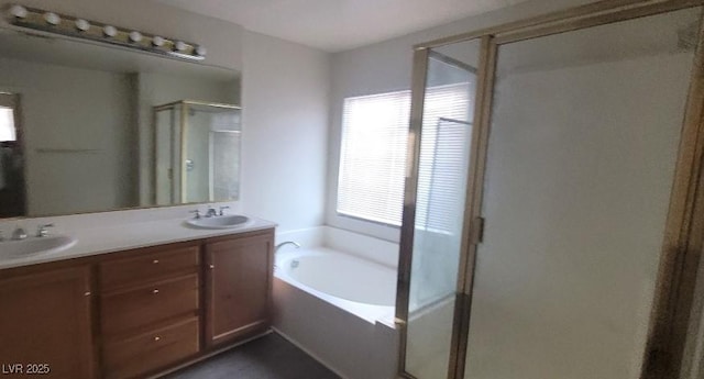 8695 Canfield Canyon Ave, Las Vegas, NV 89178 - full bathroom with a shower stall, a bath, and double vanity