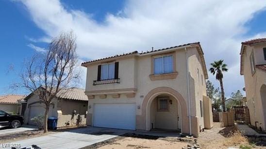 8149 Palace Monaco Ave, Las Vegas, NV 89117 - mediterranean / spanish house featuring stucco siding, driveway, a gate, a garage, and a tile roof