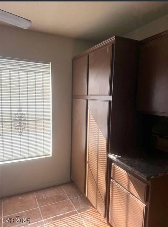 5115 Blossom Ave, Las Vegas, NV 89142 - kitchen with dark countertops