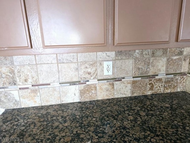 5115 Blossom Ave, Las Vegas, NV 89142 - detailed view of dark stone countertops and cream cabinetry