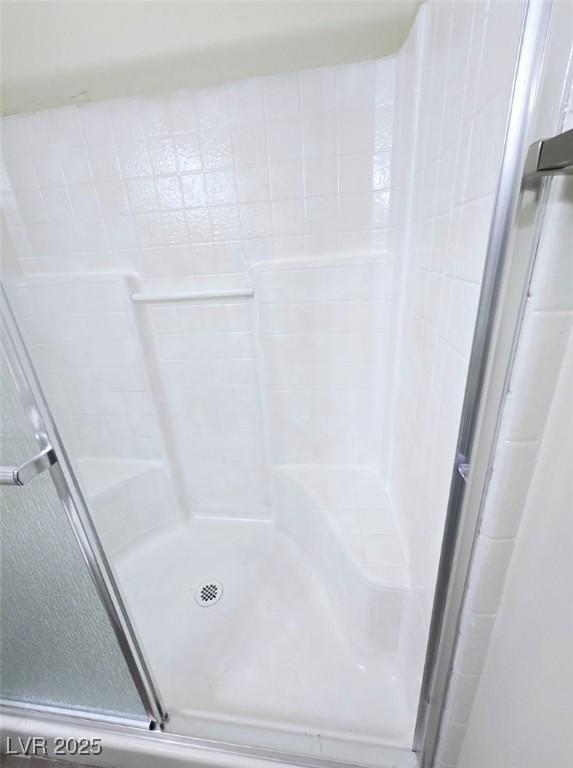 5115 Blossom Ave, Las Vegas, NV 89142 - full bathroom with a stall shower