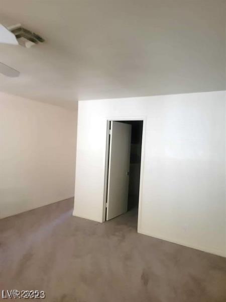 3480 E Hacienda Ave, Las Vegas, NV 89120 - empty room featuring carpet flooring