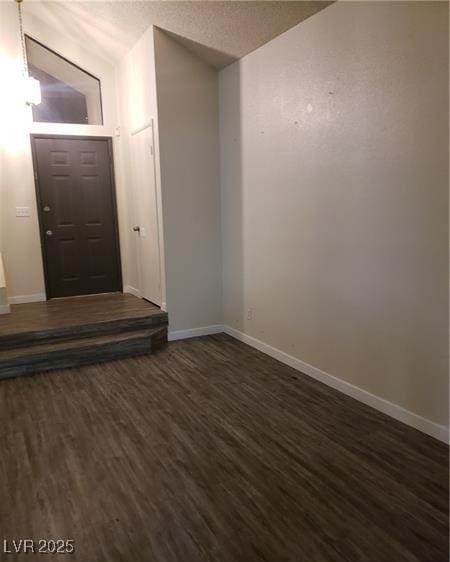 2720 Knightsbridge Rd, Henderson, NV 89074 - unfurnished room featuring dark wood finished floors and baseboards