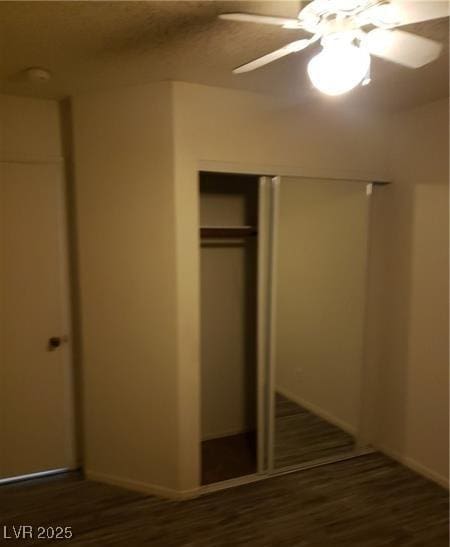 2720 Knightsbridge Rd, Henderson, NV 89074 - unfurnished bedroom featuring wood finished floors, a closet, baseboards, and ceiling fan