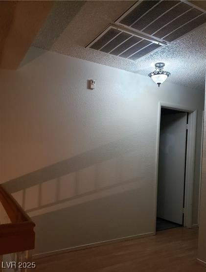2720 Knightsbridge Rd, Henderson, NV 89074 - hallway featuring wood finished floors and baseboards