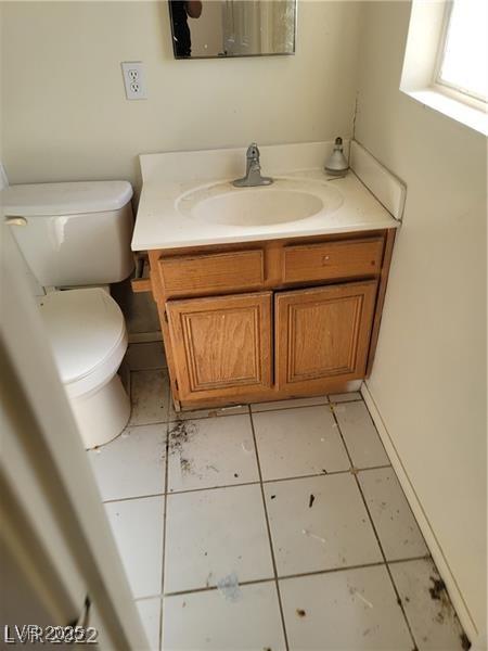1413 Bryn Mawr Ave, Las Vegas, NV 89102 - bathroom featuring vanity, toilet, and tile patterned flooring