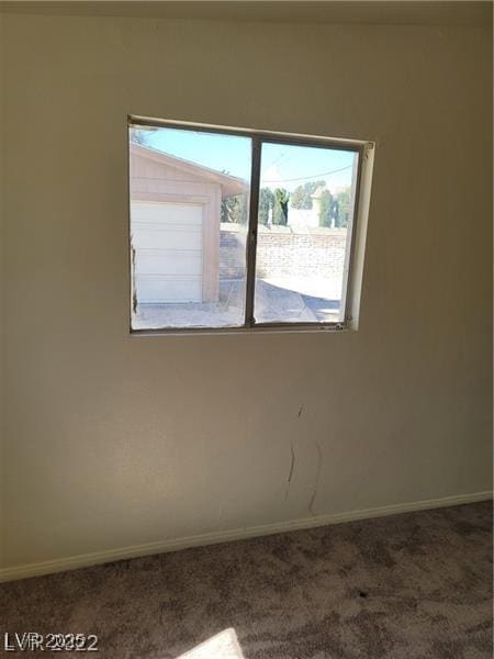 1413 Bryn Mawr Ave, Las Vegas, NV 89102 - carpeted spare room with baseboards