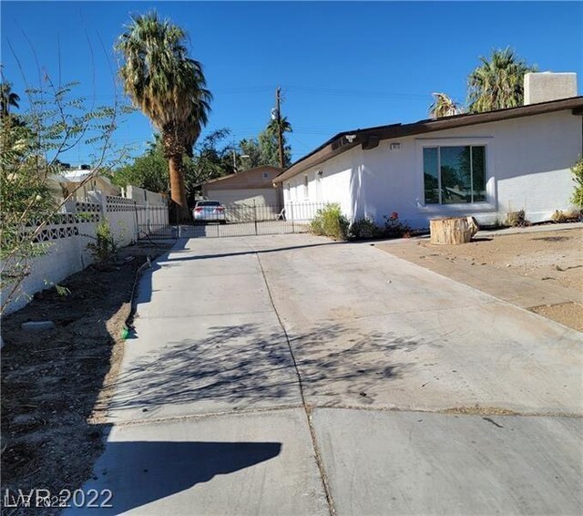1413 Bryn Mawr Ave, Las Vegas, NV 89102 - view of property exterior featuring driveway and stucco siding