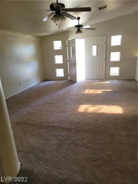 1413 Bryn Mawr Ave, Las Vegas, NV 89102 - unfurnished living room featuring carpet flooring, healthy amount of natural light, and ceiling fan