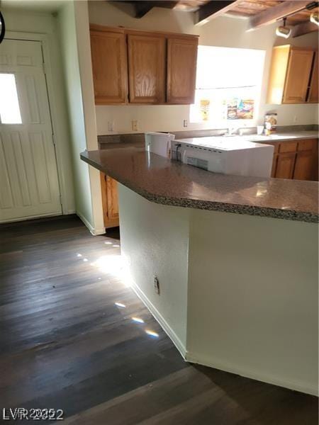 1413 Bryn Mawr Ave, Las Vegas, NV 89102 - kitchen with beamed ceiling, dark wood finished floors, baseboards, and ceiling fan
